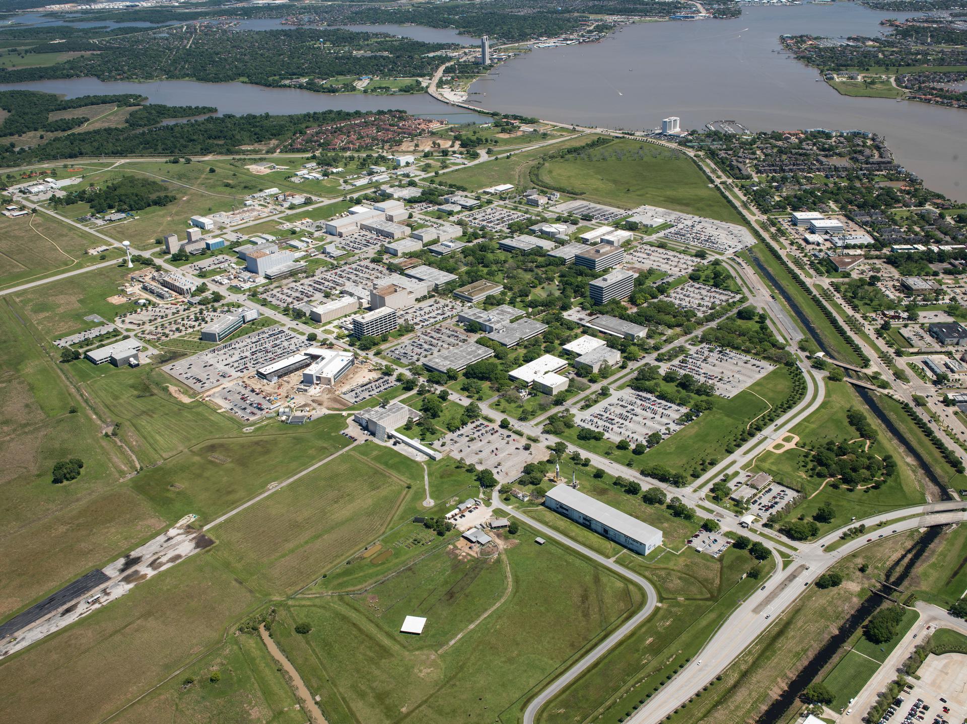 Aerial photograph of Johnson Space Center facilities taken from a U.S. Coast Guard H-65 helicopter.