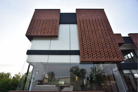 Maziar Brick House / Naghshe Khak Architectural Group - Windows, Lighting, Facade