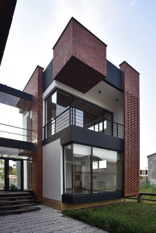 Maziar Brick House / Naghshe Khak Architectural Group - Facade, Windows