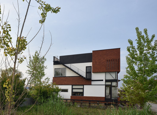 Maziar Brick House / Naghshe Khak Architectural Group - Windows, Facade