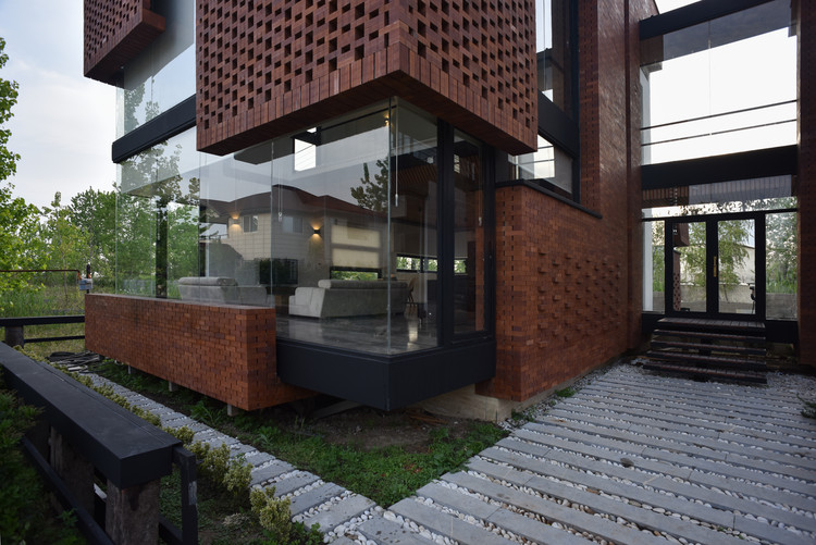 Maziar Brick House / Naghshe Khak Architectural Group - Windows, Facade, Handrail