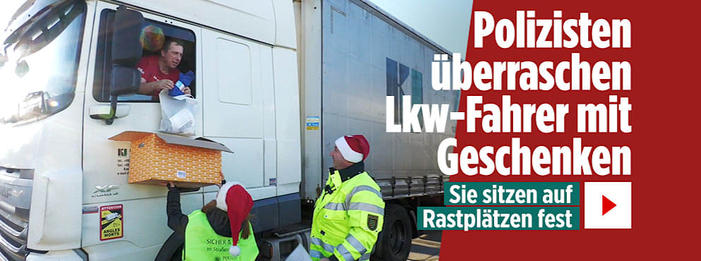 Weihnachten auf dem Rastplatz: Polizisten überraschen Lkw-Fahrer mit Geschenken