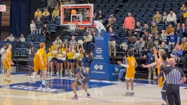 UNCG's Ronald Polite III (11) follows his game-winning shot to defeat UTC, 78-75 