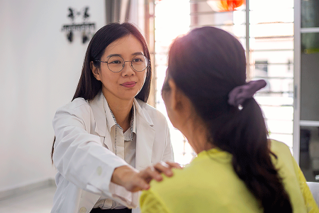 Patient talking with dermatologist about keloid scar