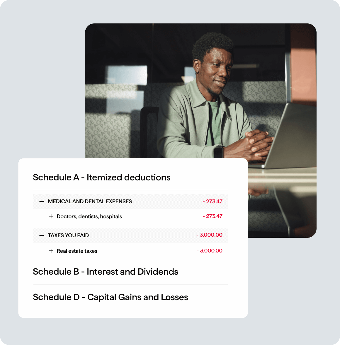 TakeOnTaxTime - A young African American Male sitting at the office, with short hair, wearing a grey shirt, working on a laptop computer, looking up, thinking with his fingers locked.