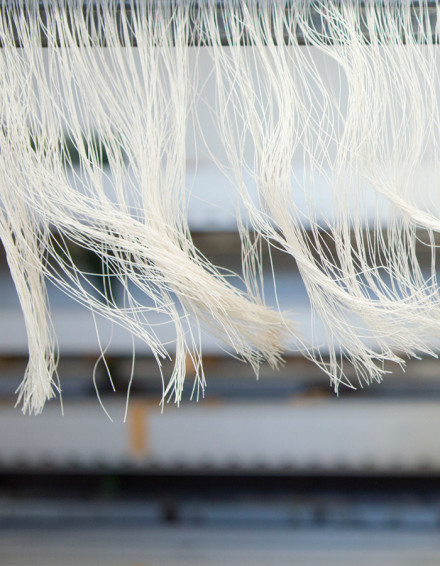 Close up photograph of fabric threads