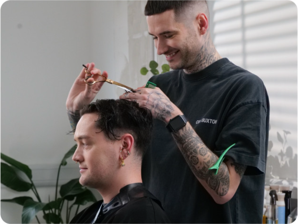 Image of a hairdresser cutting someone's hair