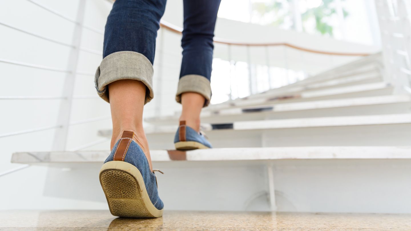 shoes legs climbing stairs