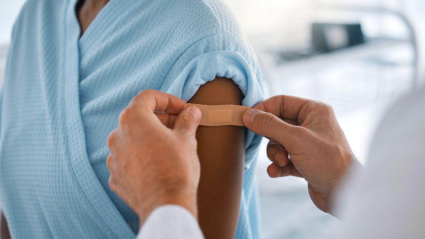 woman getting vaccine