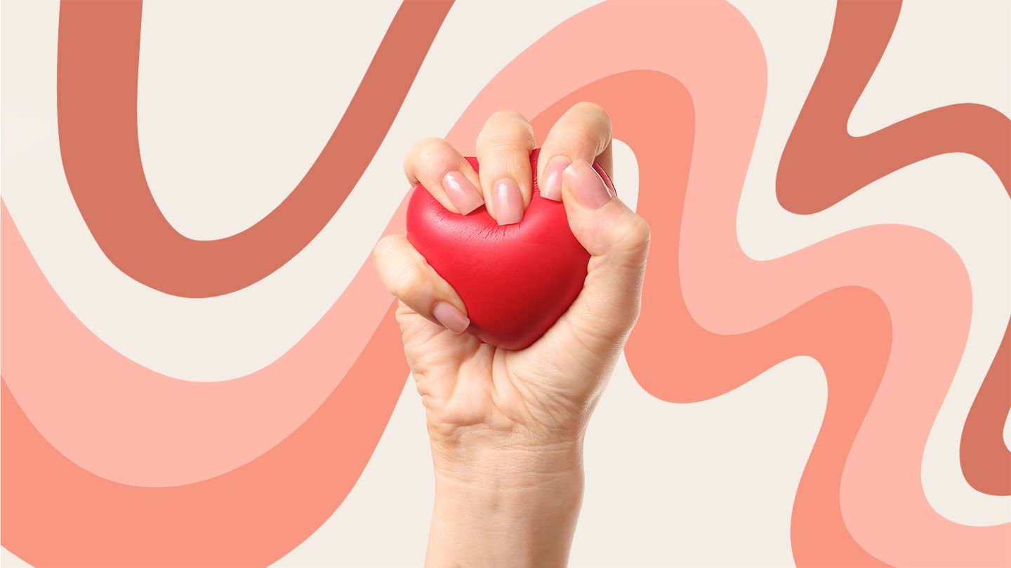 hand squeezing heart shapes stress anger ball