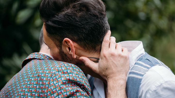 same sex gay couple men embracing