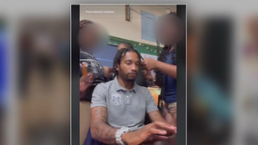 Maryland teacher under investigation after viral TikTok of students taking out his braids