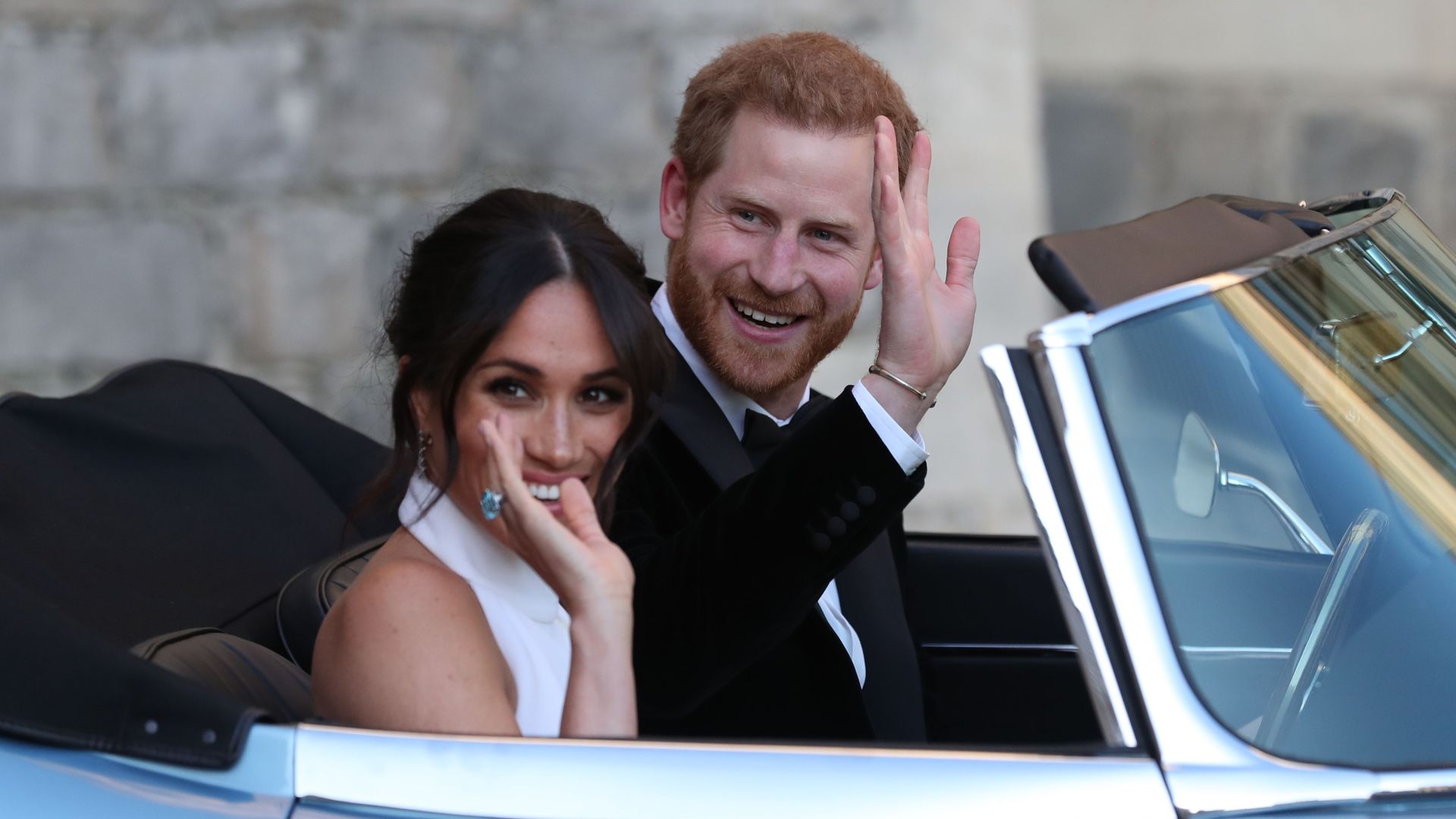 Prince Harry driving Meghan Markle on their wedding day