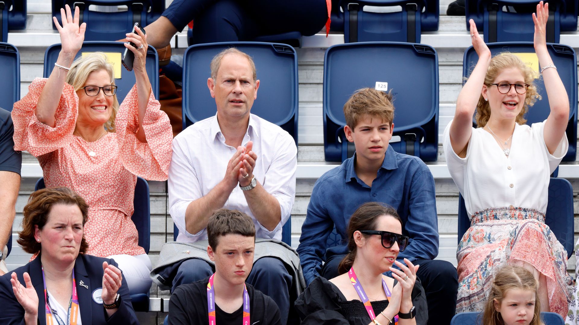 sophie, edward, louise and james cheering at hockey match