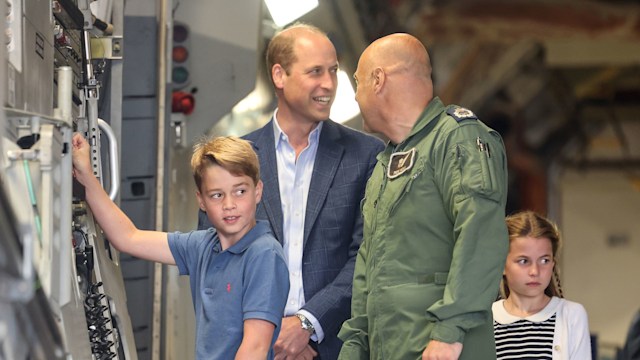 Prince George operating a machine at air show