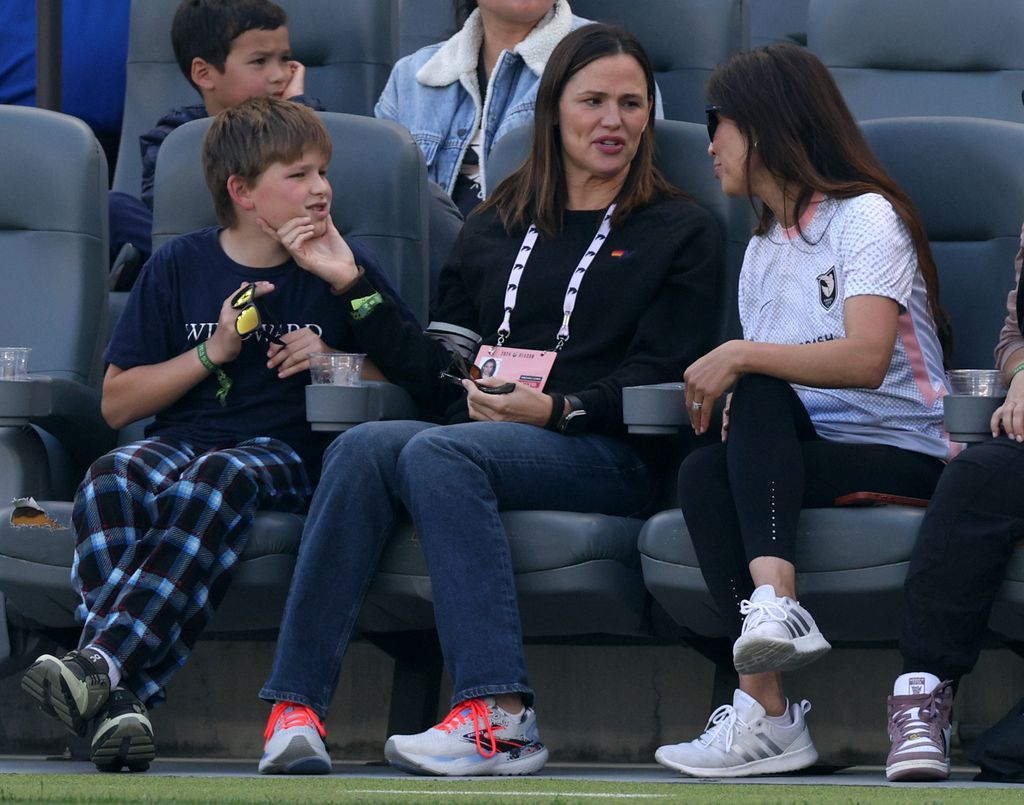 Actress Jennifer Garner and son Samuel Garner Affleck on the sidelines during the game between the Houston Dash and the Angel City FC during a 1-0 Dash win at BMO Stadium on May 12, 2024 in Los Angeles, California.