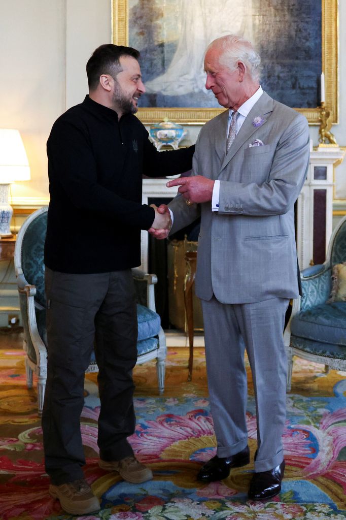 Volodymyr Zelenskyy shaking King Charles' hand