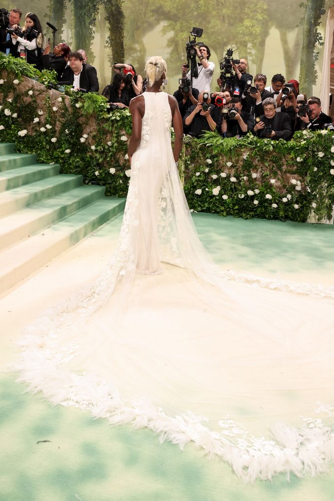 The back of Jodie Turner-Smith's white dress and train