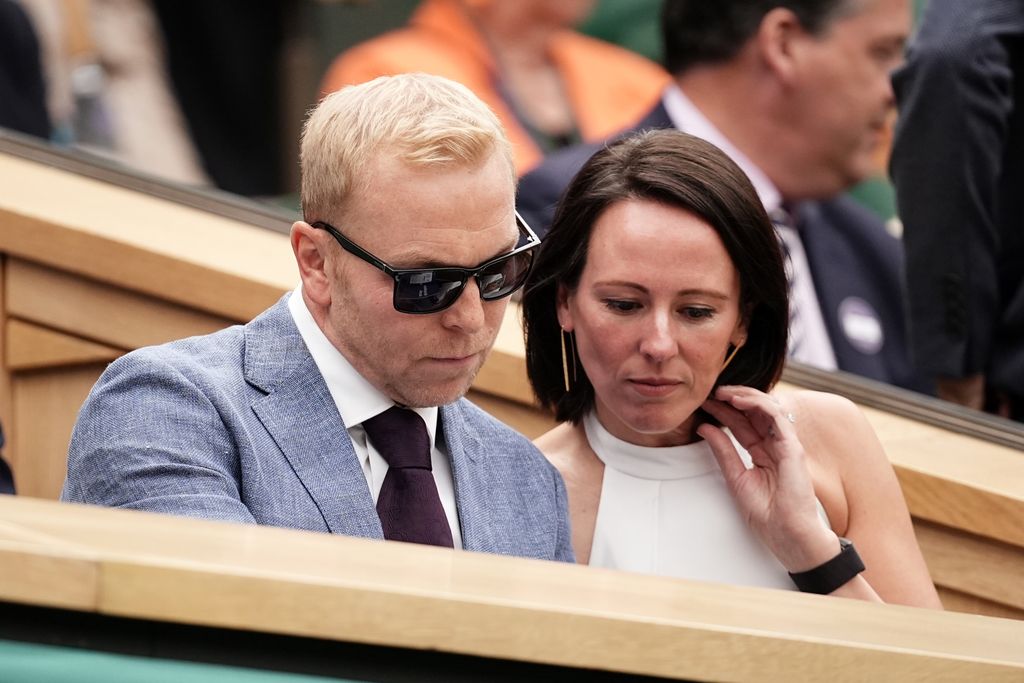 Sir Chris Hoy and his wife Sarra looking down