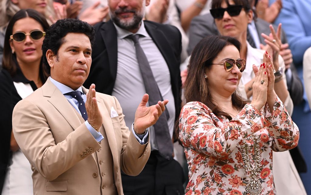  Sachin Tendulkar and Anjali Temdulkar applaud from the Royal Box