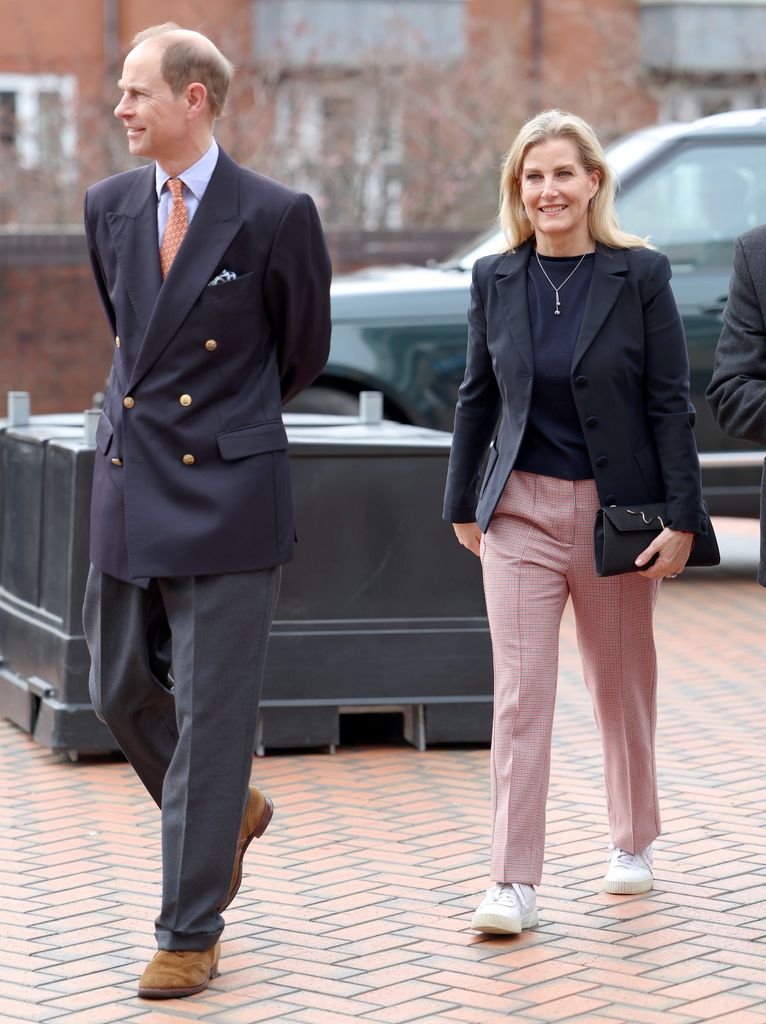 Prince Edward wearing blazer next to sophie