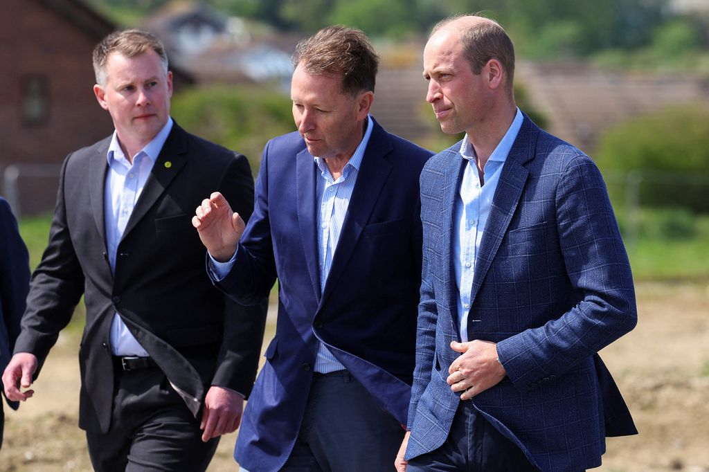 William with Alastair Martin (C) Secretary of Duchy of Cornwall, during a visit to a Duchy of Cornwall housing project in Newquay in May