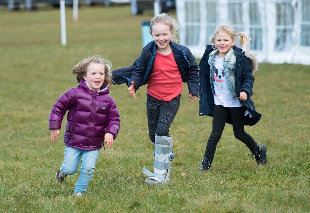 Isla and savannah Phillips play with Mia Tindall