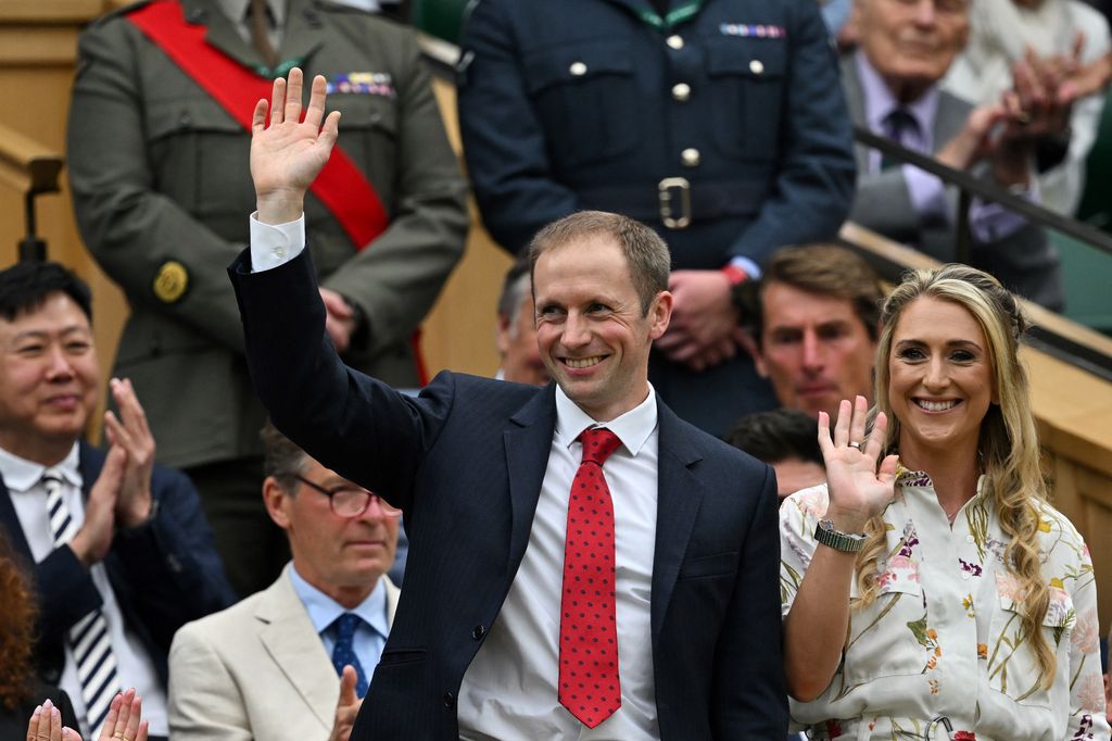 Jason Kenny and Laura Kenny wave to the crowd from the Royal box