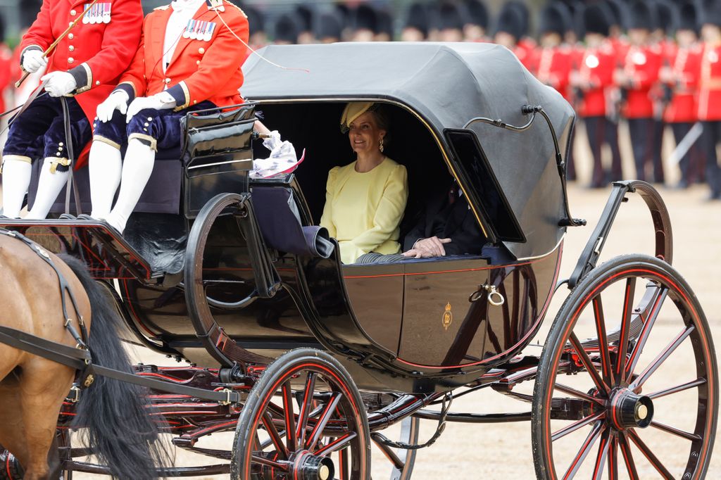 Duchess Sophie in yellow in a majestic carriage