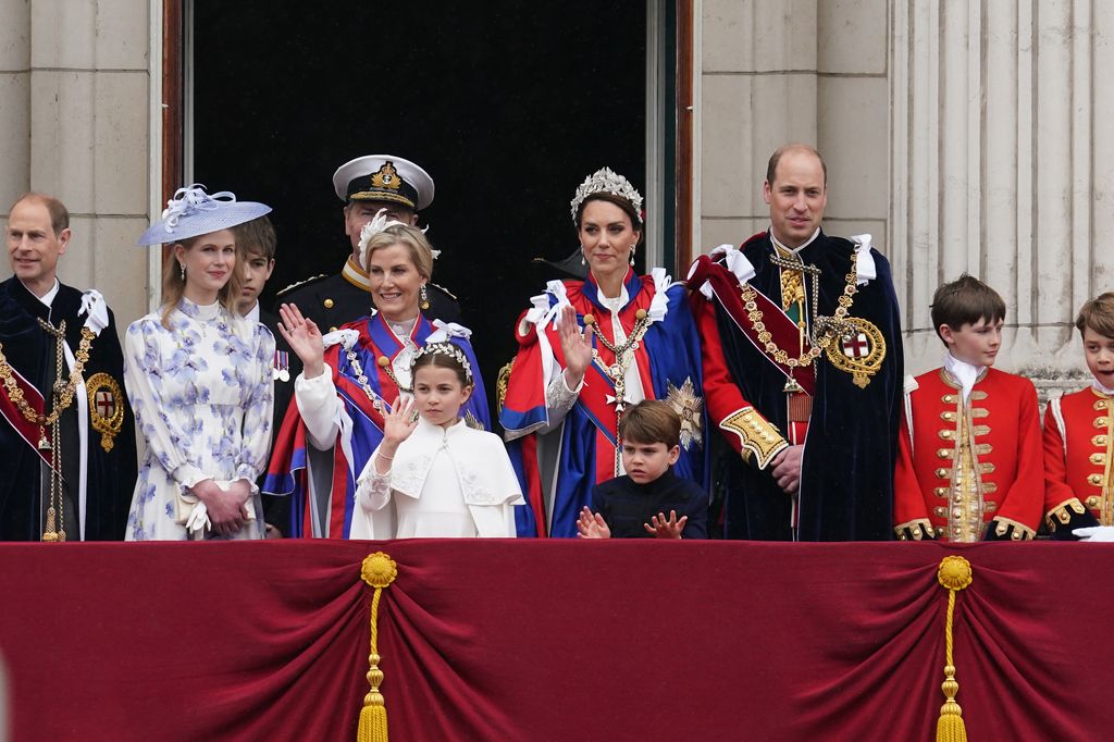 Prince Louis claps and waved as he views a flypast at Buckingham Palace