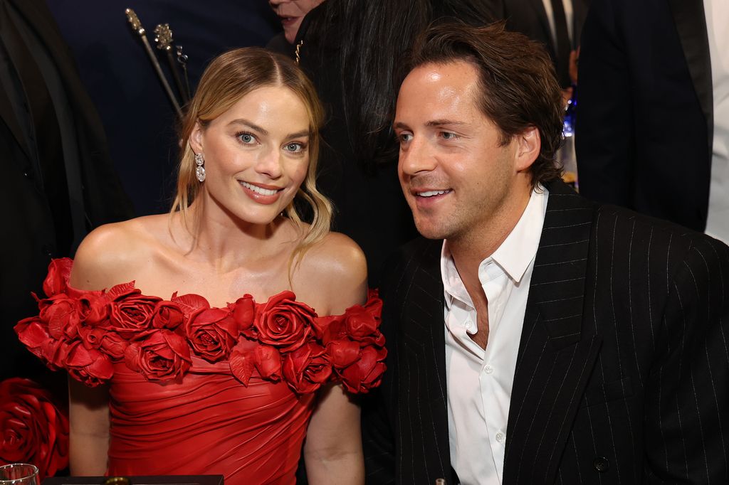 SANTA MONICA, CALIFORNIA - JANUARY 14: Margot Robbie and Tom Ackerley attend the 29th Annual Critics Choice Awards at Barker Hangar on January 14, 2024 in Santa Monica, California. (Photo by Kevin Mazur/Getty Images for Critics Choice Association)