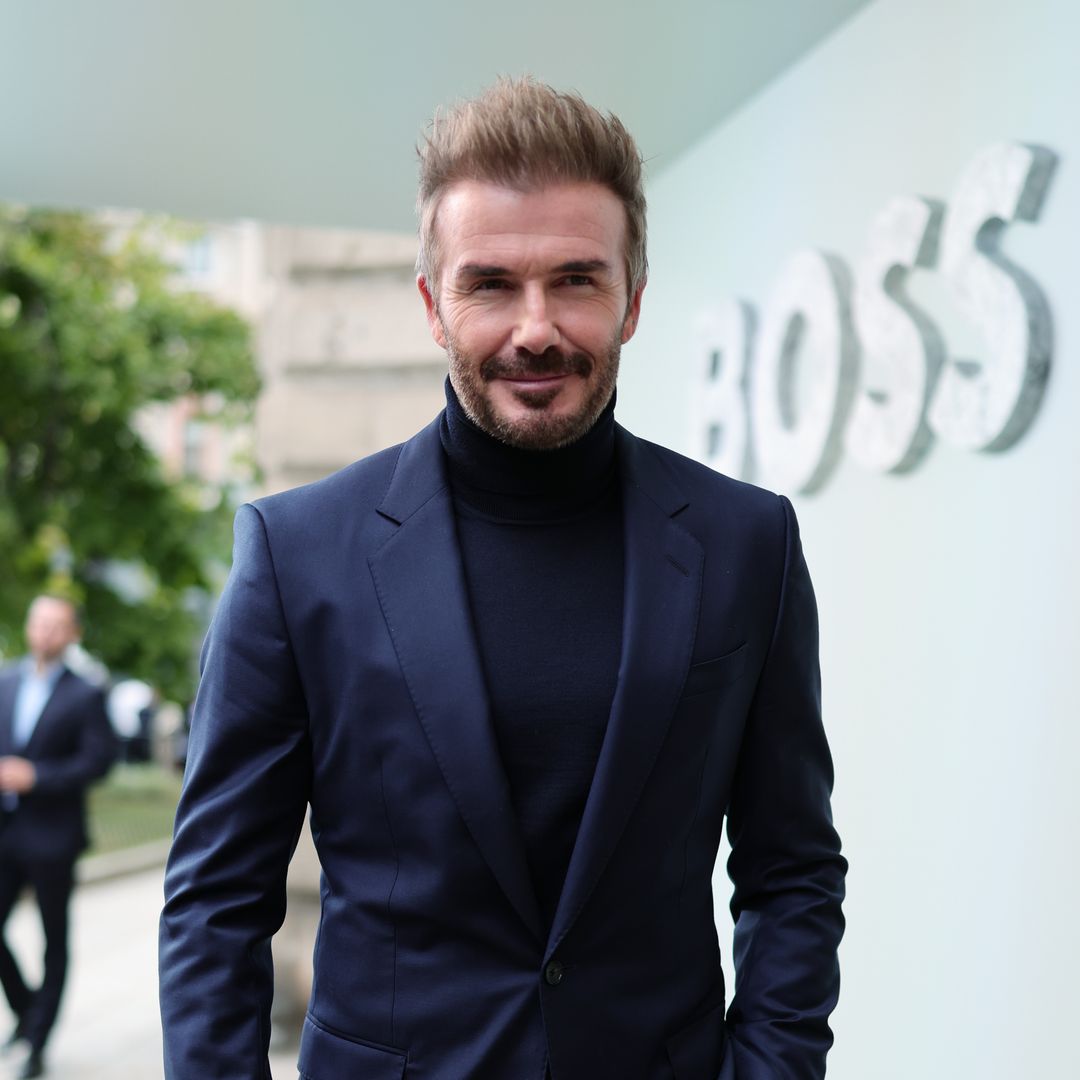 David Beckham wears Victoria's signature catwalk outfit at Milan Fashion Week