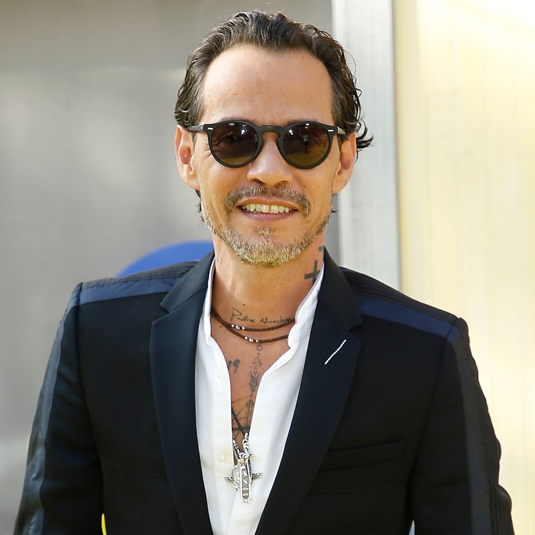 Marc Anthony's rarely-seen sons tower over him in celebratory photo