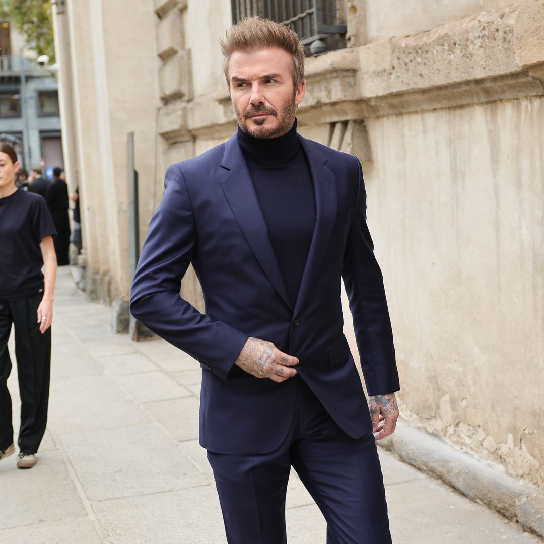 David Beckham turns heads on front row at Fashion Week without Victoria - and fans have questions