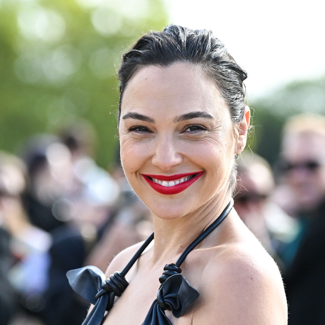 Gal Gadot looks phenomenal in plunging leather dress during Paris Fashion Week