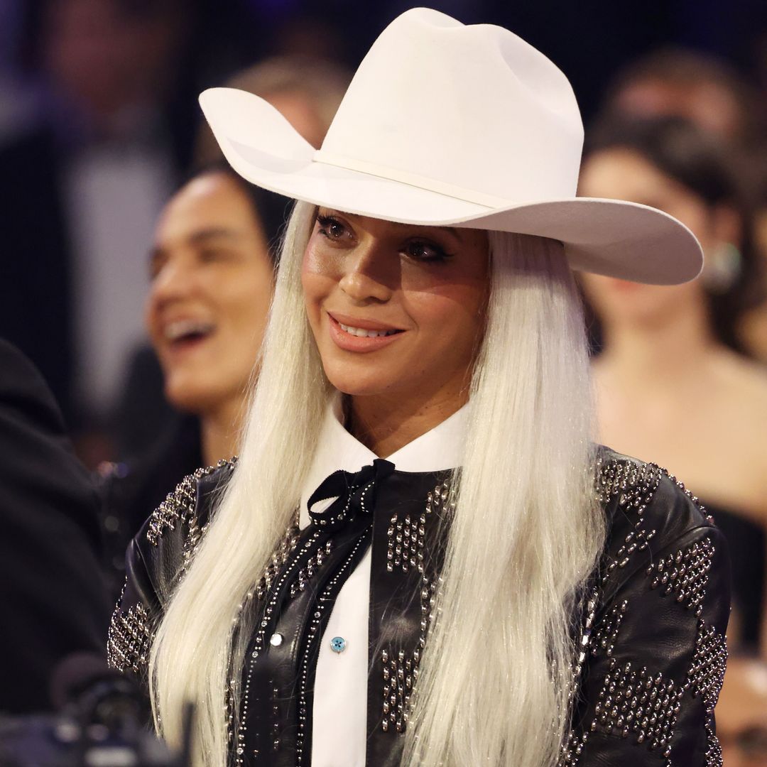 Beyonce looks sensational in double denim and cowboy hat