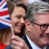 British Prime Minister Keir Starmer and his wife, Victoria Starmer, greet Labour campaigners and activists at 10 Downing Street following the results of the election, in London on Friday. 