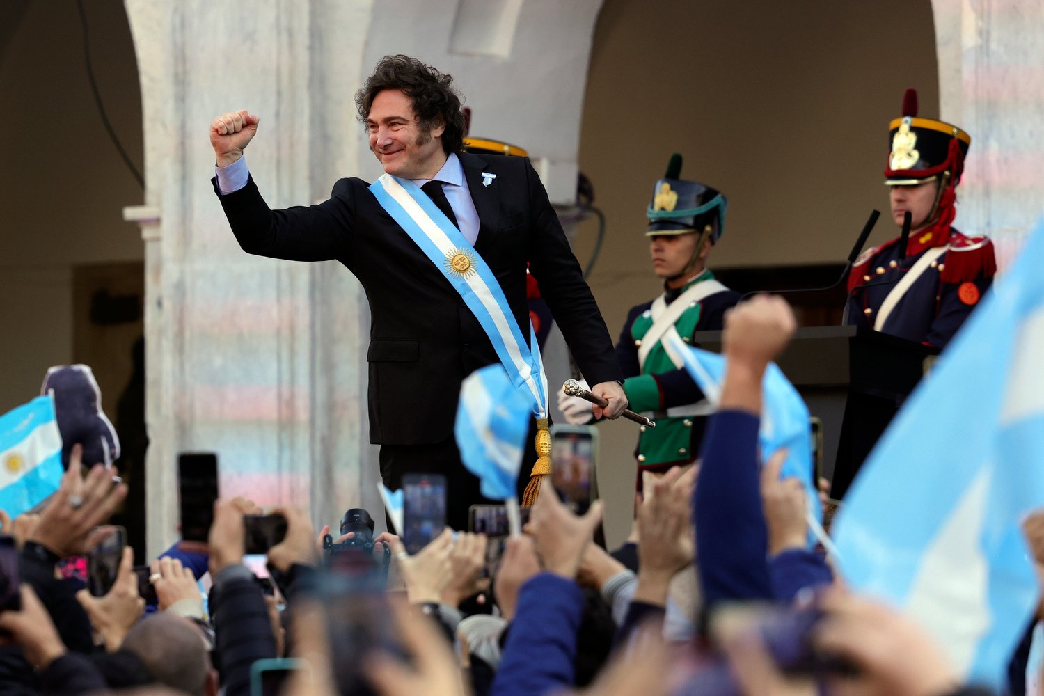  Argentine President Javier Milei gestures to people attending a ceremony marking the 214th anniversary of the May Revolution, which marked the start of the country's independence from Spain, in Cordoba, Argentina, May 25, 2024. (AP Photo/Nicolas Agu