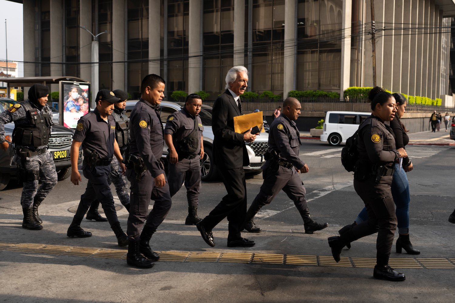  Police escort Guatemalan journalist Jose Ruben Zamora to court in handcuffs for a hearing in Guatemala City, May 15, 2024. Zamora has spent nearly two years locked up in prison, allowed only one hour a day in the sunlight. His money laundering convi