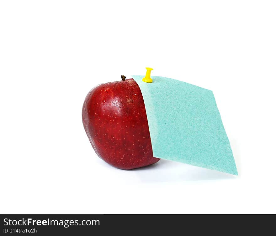 Red apple and note paper isolated on white background