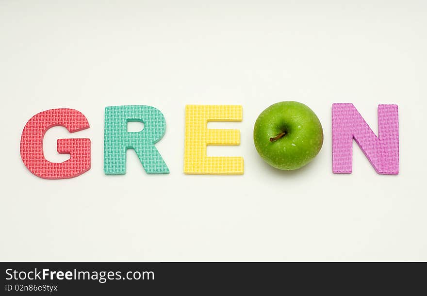 A green apple in a green alphabet