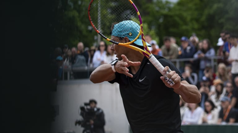 The bulk of this practice entailed pummeling forehands.