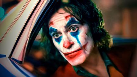 Joaquin Phoenix Joker in cop car