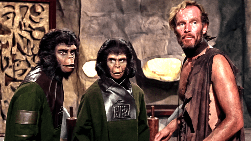 Charlton Heston and a pair of apes from Planet of the Apes