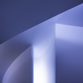 an abstract photograph of a curved wall