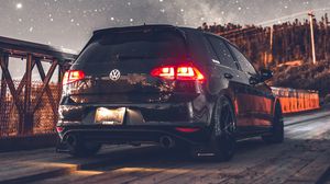 Preview wallpaper volkswagen, car, rear view, headlights, starry sky