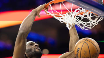 Feb 22, 2024; Philadelphia, Pennsylvania, USA; New York Knicks forward Precious Achiuwa (5) dunks the ball against the Philadelphia 76ers during the first quarter at Wells Fargo Center. Mandatory Credit: Bill Streicher-USA TODAY Sports