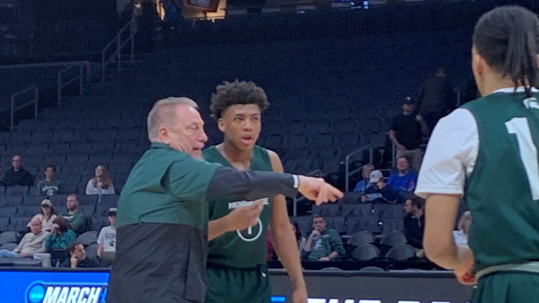 Jeremy Fears and Tom Izzo talk during Michigan State basketball's open practice Wednesday, March 20, 2024, at Spectrum Center in Charlotte, N.C. The Spartans face Mississippi State in the NCAA tournament, but Fears remains out after being shot in December 2023.