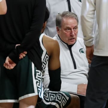 Feb 14, 2024; University Park, Pennsylvania, USA; Michigan State Spartans head coach Tom Izzo sits in the huddle during a timeout during the second half against the Penn State Nittany Lions at Bryce Jordan Center. Michigan State defeated Penn State 80-72. Mandatory Credit: Matthew O'Haren-USA TODAY Sports
