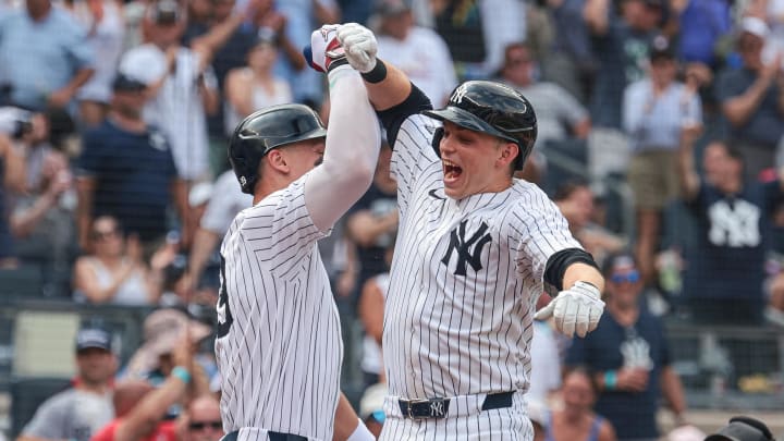Jul 6, 2024; Bronx, New York, USA; New York Yankees first baseman Ben Rice (93) celebrates after his third home run of the game, a three run home run, with center fielder Aaron Judge (99) during the seventh inning against the Boston Red Sox at Yankee Stadium. Mandatory Credit: Vincent Carchietta-USA TODAY Sports